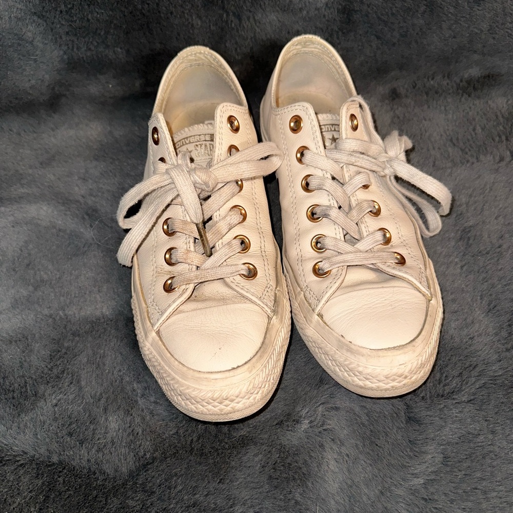 Beige leather converse